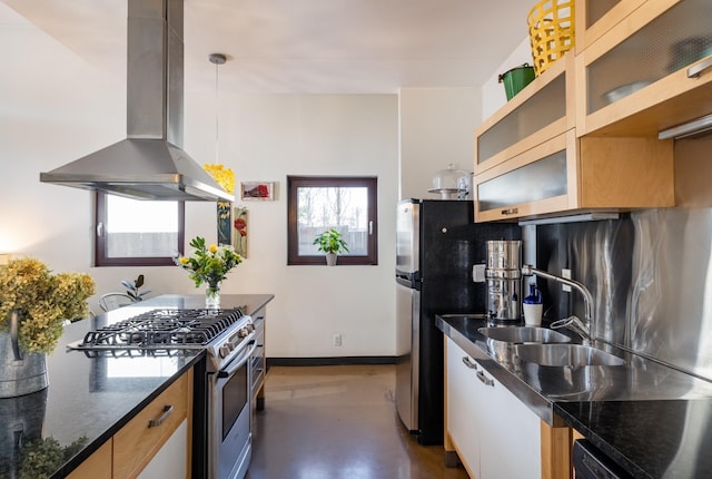 kitchen featuring finished concrete flooring, glass insert cabinets, baseboards, island range hood, and stainless steel appliances