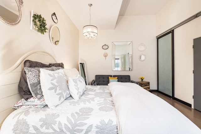 bedroom with a notable chandelier