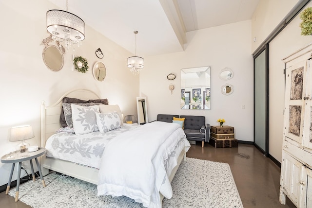 bedroom with an inviting chandelier and baseboards