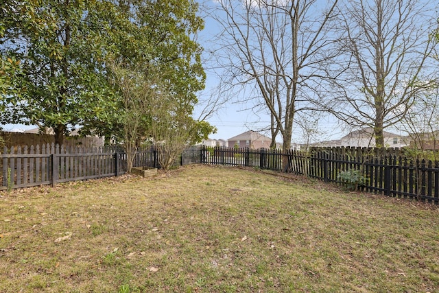 view of yard featuring a fenced backyard