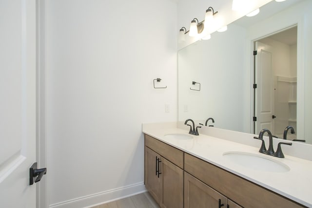 2359 Williamsport Lndg, Columbia, TN 38401 - full bathroom featuring baseboards, double vanity, and a sink