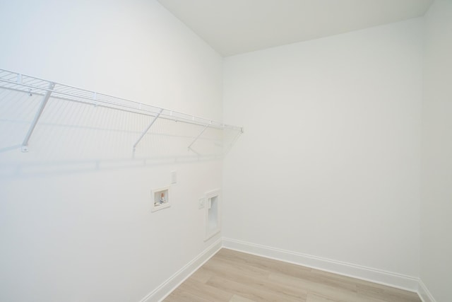 2359 Williamsport Lndg, Columbia, TN 38401 - laundry area featuring light wood-style flooring, baseboards, washer hookup, laundry area, and hookup for an electric dryer