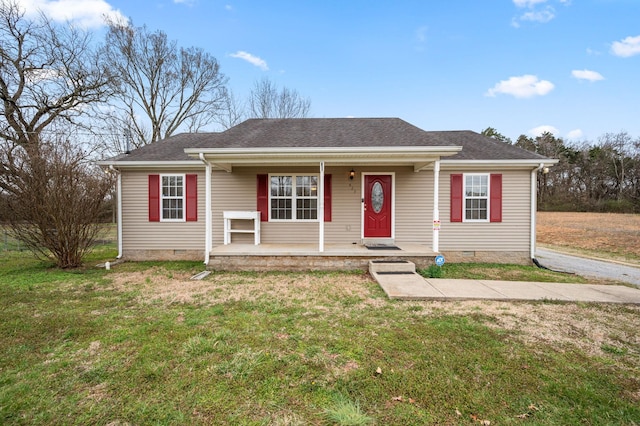 view of front of property with a front lawn, covered porch, roof with shingles, and crawl space