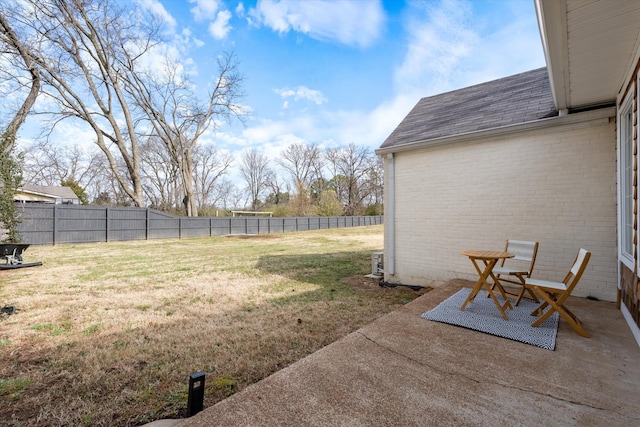 view of yard with a patio and a fenced backyard