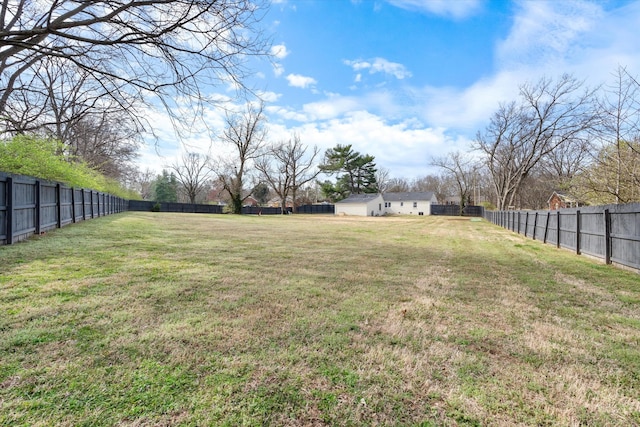 view of yard featuring a fenced backyard