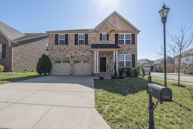 traditional-style house featuring a front yard, an attached garage, brick siding, and driveway