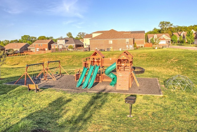 view of play area featuring a residential view and a lawn