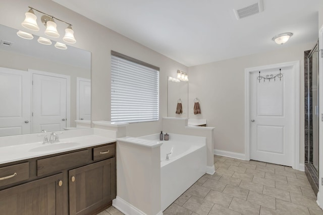 full bathroom with a shower with door, visible vents, a garden tub, and vanity