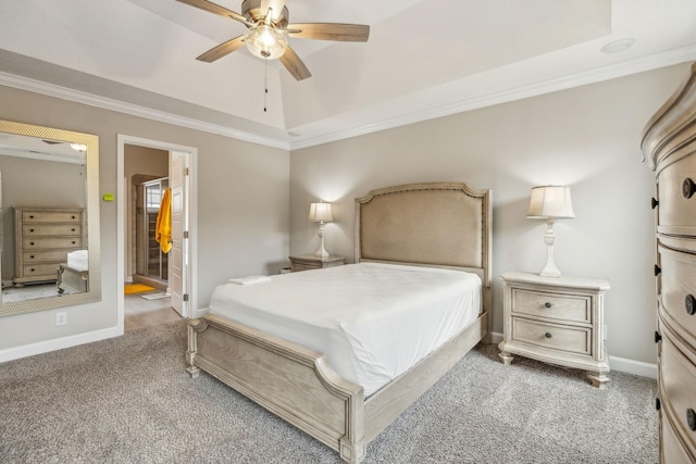 bedroom featuring baseboards, a raised ceiling, carpet, and ornamental molding