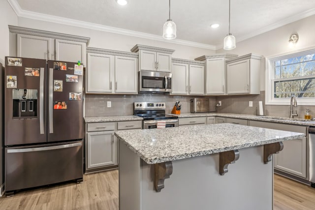 1025 Brightwood Ct, Clarksville, TN 37043 - kitchen with ornamental molding, appliances with stainless steel finishes, gray cabinetry, and a sink