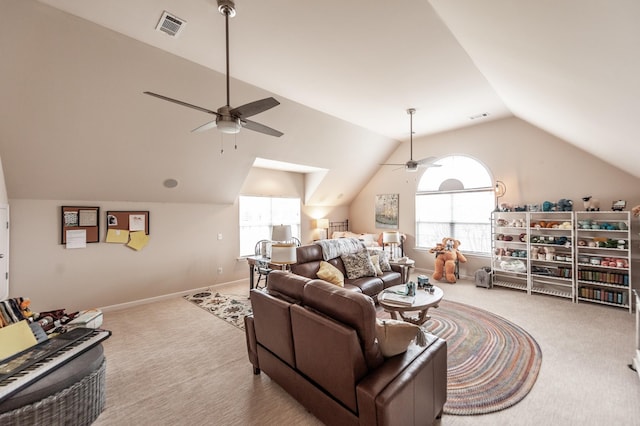 carpeted living area featuring visible vents, a ceiling fan, and vaulted ceiling