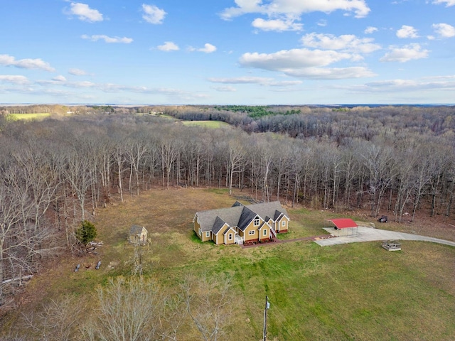 aerial view with a wooded view