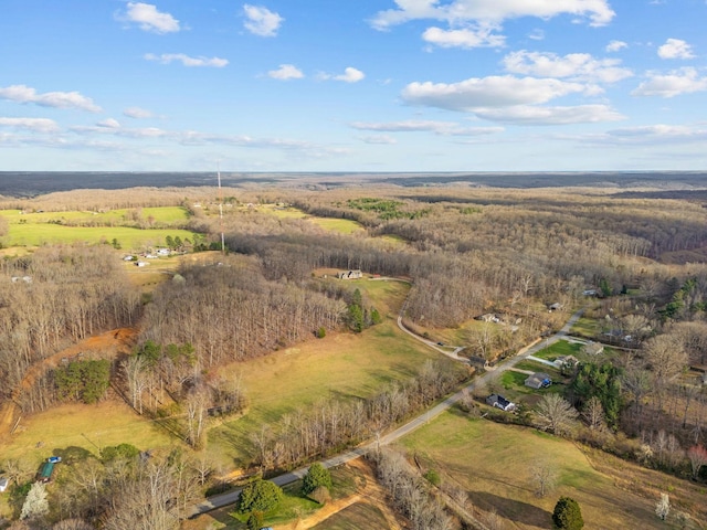 birds eye view of property with a rural view
