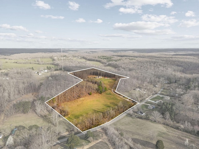 birds eye view of property with a rural view