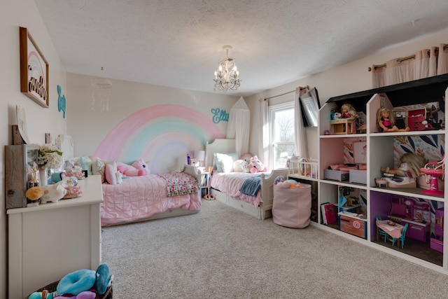 carpeted bedroom featuring a textured ceiling and a chandelier