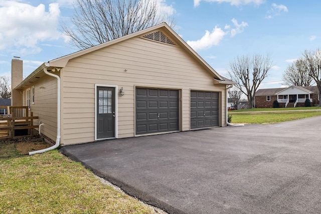 garage with driveway