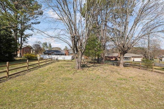 view of yard featuring fence