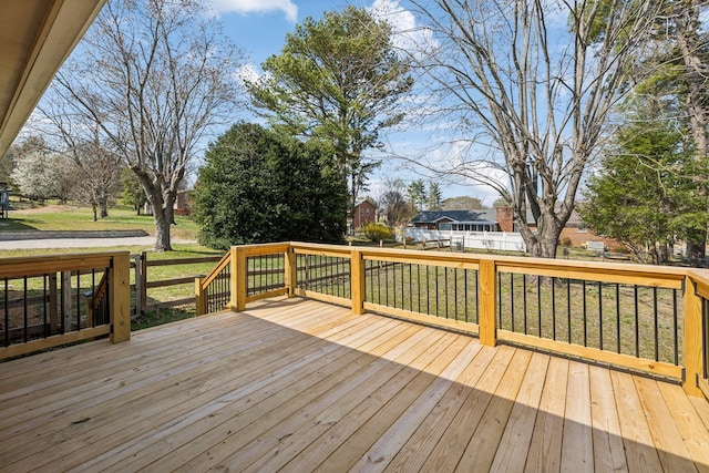 deck featuring a lawn