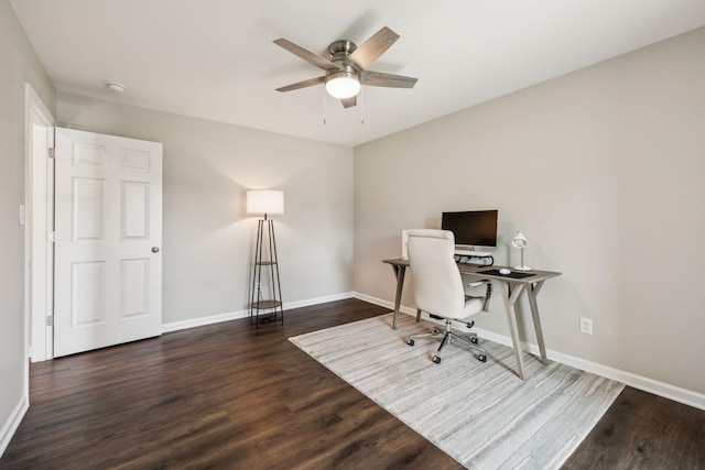 office area with wood finished floors, baseboards, and ceiling fan