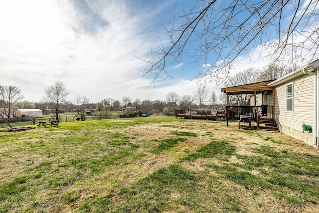 view of yard featuring a deck