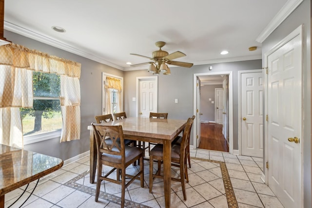 dining space with crown molding, recessed lighting, baseboards, and ceiling fan