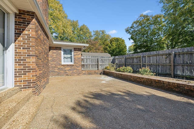 view of patio with a fenced backyard