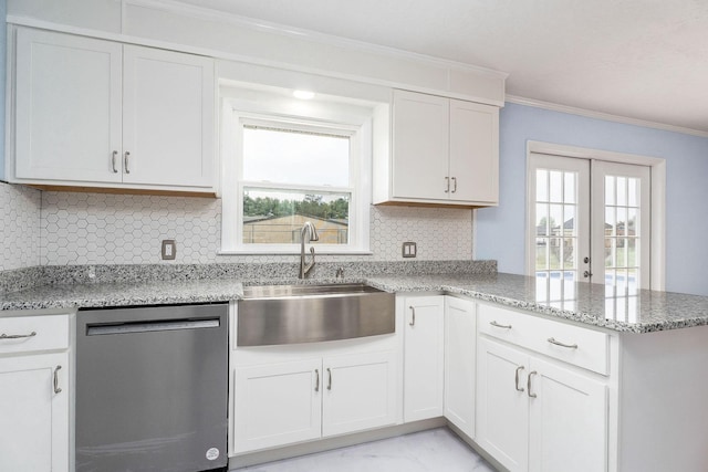 210 Gillen Dr, Sparta, TN 38583 - kitchen with tasteful backsplash, dishwasher, a sink, a peninsula, and crown molding