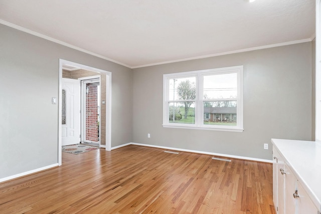 210 Gillen Dr, Sparta, TN 38583 - interior space featuring light wood-type flooring, baseboards, and ornamental molding