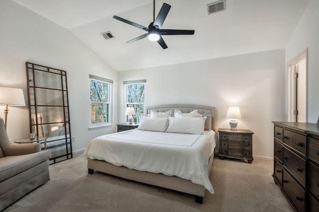 bedroom featuring visible vents, light colored carpet, baseboards, and lofted ceiling