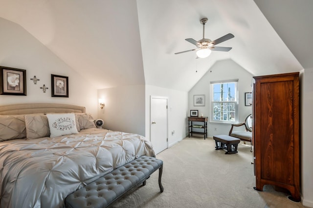 bedroom featuring a ceiling fan, lofted ceiling, and light colored carpet