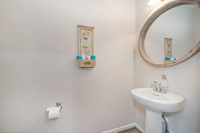 bathroom featuring baseboards