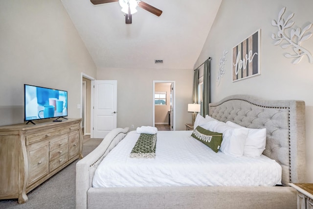 bedroom with visible vents, high vaulted ceiling, ceiling fan, ensuite bathroom, and light carpet