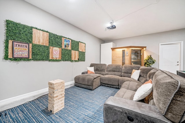 living area featuring baseboards