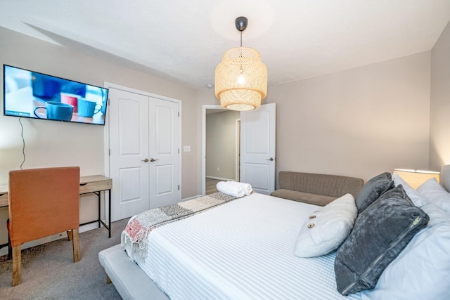 carpeted bedroom featuring a closet