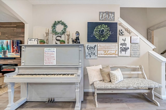 details featuring baseboards and wood finished floors