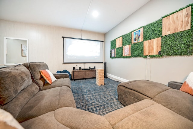 carpeted living room with baseboards