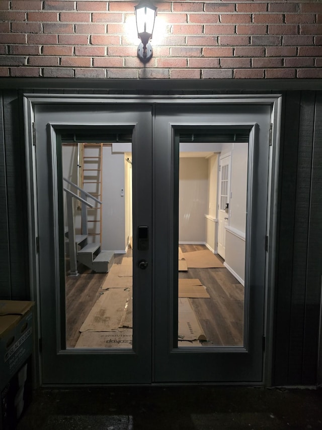 room details with wood finished floors and french doors