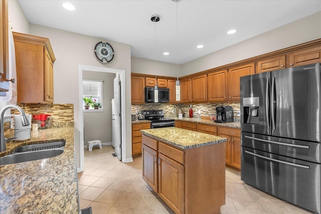kitchen featuring light tile patterned floors, decorative backsplash, and stainless steel appliances