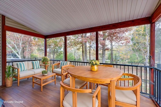 sunroom with an outdoor hangout area