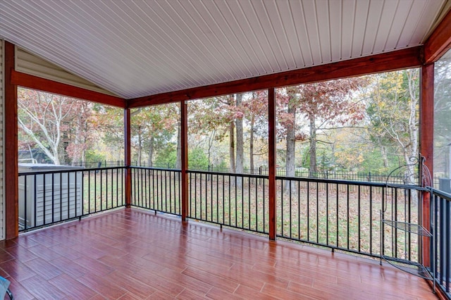 unfurnished sunroom featuring a wealth of natural light