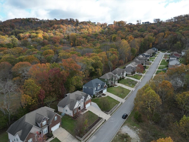 bird's eye view with a view of trees and a residential view