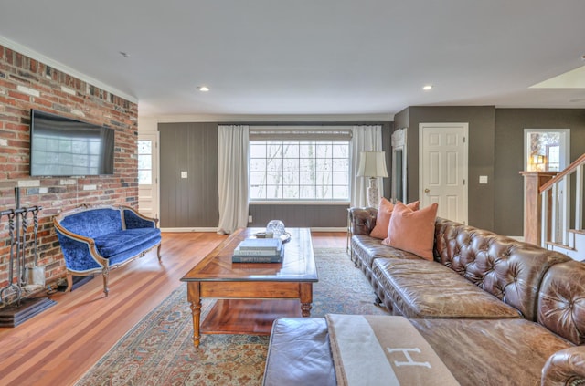 living room featuring recessed lighting and wood finished floors