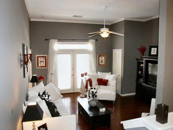 living room with french doors, crown molding, a ceiling fan, and wood finished floors