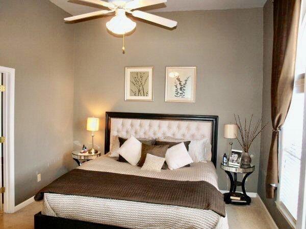 bedroom featuring baseboards and ceiling fan