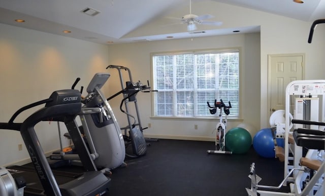 exercise room featuring visible vents, baseboards, a ceiling fan, and vaulted ceiling