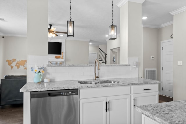 kitchen with a ceiling fan, visible vents, ornamental molding, a sink, and stainless steel dishwasher