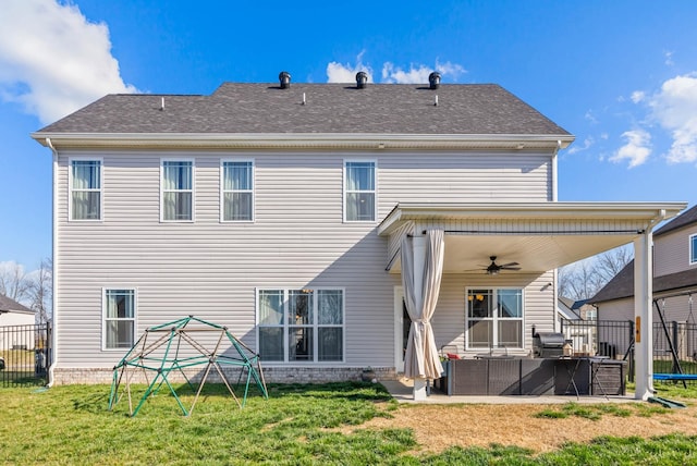 back of house with an outdoor living space, fence, a lawn, a patio area, and a ceiling fan