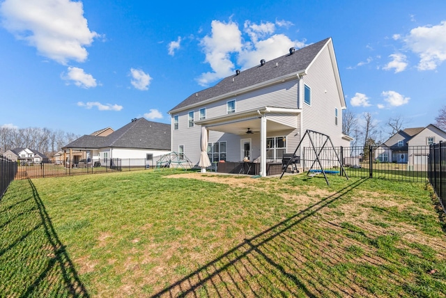 back of house with a patio, a fenced backyard, ceiling fan, a lawn, and a residential view