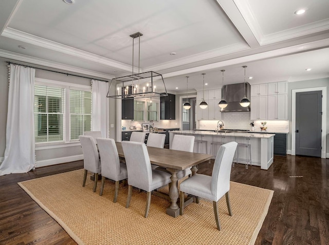 dining space featuring a notable chandelier, baseboards, dark wood-style flooring, and ornamental molding