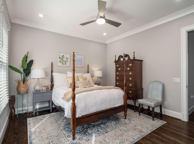 bedroom with crown molding, multiple windows, wood finished floors, and baseboards